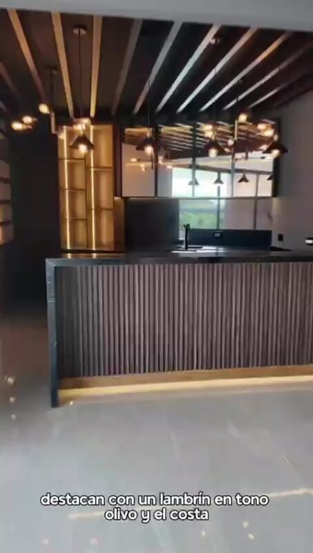 Cocina exterior con azulejos y acabados seleccionados por Cuatlayotl y Asociados